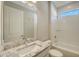 The bathroom features granite counters, a soaking tub and shower combo, and crisp white tile at 4914 Carova Way, Lakewood Ranch, FL 34211