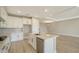 Bright and spacious kitchen features a center island and seamlessly connects to the living area at 4914 Carova Way, Lakewood Ranch, FL 34211