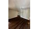 Spacious living room with wood floors at 6405 Gainsboro Dr, Port Richey, FL 34668