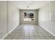 Versatile bonus room with neutral walls and tile flooring, perfect for customization at 8326 Iberia Pl, Tampa, FL 33637