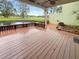 Expansive deck overlooking picturesque pond, great for outdoor entertaining or relaxing at 13516 Palmwood Ln, Tampa, FL 33618