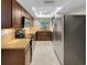 Modern kitchen with granite countertops and stainless steel appliances at 13516 Palmwood Ln, Tampa, FL 33618