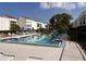 Relaxing community pool with lounge chairs and well-maintained surroundings at 2060 Marilyn St # 234, Clearwater, FL 33765