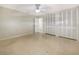 Spacious bedroom with carpeting and features ample closet storage at 513 Flamingo Dr, Apollo Beach, FL 33572