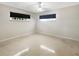 Neutral bedroom featuring natural light and carpeted flooring at 513 Flamingo Dr, Apollo Beach, FL 33572