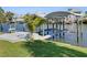 Well-maintained boat dock with boat lift, perfect for waterfront living at 513 Flamingo Dr, Apollo Beach, FL 33572