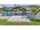 Private boat dock with boat lift, providing direct access to the water at 513 Flamingo Dr, Apollo Beach, FL 33572