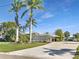 Charming single-story home with mature landscaping and a spacious driveway at 513 Flamingo Dr, Apollo Beach, FL 33572