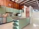 Modern kitchen with stainless appliances and a sleek island at 513 Flamingo Dr, Apollo Beach, FL 33572