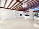 Spacious living room with beamed ceiling, fireplace, and ample natural light at 513 Flamingo Dr, Apollo Beach, FL 33572