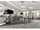 Bright community gym featuring modern equipment, mirrored walls, and large windows at 17936 Polo Trl, Bradenton, FL 34211