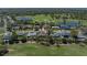 An aerial view showing this home on the golf course at 650 Poinsettia Rd, Belleair, FL 33756