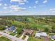 An aerial view of the golf course with nearby housing at 650 Poinsettia Rd, Belleair, FL 33756