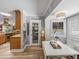 Eat in kitchen features an integrated breakfast nook and an entry to the kitchen at 650 Poinsettia Rd, Belleair, FL 33756