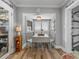 Bright eat-in kitchen with a bay window and a charming breakfast nook seating area at 650 Poinsettia Rd, Belleair, FL 33756