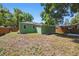 Expansive fenced-in backyard with plenty of room for outdoor activities and entertaining at 1206 E Hamilton Ave, Tampa, FL 33604