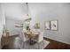 Elegant dining area with modern light fixture and a large table for Gathering gatherings at 1206 E Hamilton Ave, Tampa, FL 33604