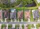 An aerial view of the homes displaying the landscaping and neighborhood at 2709 Coco Palm Cir, Wesley Chapel, FL 33543