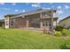 Spacious backyard with large, screened patio perfect for outdoor entertaining at 2709 Coco Palm Cir, Wesley Chapel, FL 33543