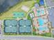 Aerial view of community amenities including a pool, tennis courts and playground at 2709 Coco Palm Cir, Wesley Chapel, FL 33543