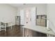 Bright office featuring two desks with views of a connecting room at 2709 Coco Palm Cir, Wesley Chapel, FL 33543