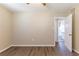 Bedroom with wood flooring offers access to the adjoining bathroom at 6730 32Nd N Ave, St Petersburg, FL 33710