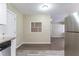 Bright kitchen with granite countertops, stainless steel appliances, and wood-look floors at 6730 32Nd N Ave, St Petersburg, FL 33710