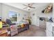 This playful bedroom includes a window for ample natural light and neutral walls at 7617 Wallflower Trl, Wesley Chapel, FL 33545