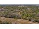 Aerial view of property showing lot lines with tree coverage, privacy and location at 18218 Railroad Rd, Spring Hill, FL 34610
