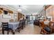 Bright, airy living area with a dining table, seamlessly connected to the living space at 18218 Railroad Rd, Spring Hill, FL 34610