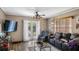 Inviting living room filled with natural light and comfortable seating near the backyard access at 18218 Railroad Rd, Spring Hill, FL 34610