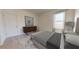Cozy bedroom featuring a plush bed, neutral tones, and modern decor and bright natural lighting at 36183 Canelli Way, Dade City, FL 33523