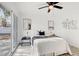 Cozy bedroom with neutral decor, access to the yard and modern accents at 4907 21St W Ave, Bradenton, FL 34209