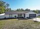 Well maintained single Gathering home featuring a two-car garage and manicured lawn at 4907 21St W Ave, Bradenton, FL 34209