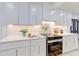 Bright kitchen features white cabinets, quartz countertops, and stainless steel appliances at 4907 21St W Ave, Bradenton, FL 34209