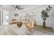 Bright living room features neutral decor, natural textures, and large windows at 4907 21St W Ave, Bradenton, FL 34209