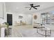 Bright living room featuring wood plank flooring, contemporary furniture, decor, and natural light at 4907 21St W Ave, Bradenton, FL 34209