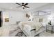 Calming main bedroom featuring a ceiling fan, ample natural light, and a spacious layout at 4907 21St W Ave, Bradenton, FL 34209