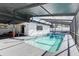 Indoor swimming pool with railing and covered patio at 4907 21St W Ave, Bradenton, FL 34209