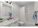 Bathroom features a modern vanity with marble countertop and a shower-tub combination at 5303 Glen Harwell Rd, Plant City, FL 33566