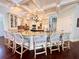 Open kitchen featuring granite countertops, custom cabinets and island seating at 1570 Oakford Rd, Sarasota, FL 34240