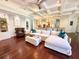 Open living room featuring a fireplace and view into the kitchen at 1570 Oakford Rd, Sarasota, FL 34240