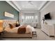 Inviting main bedroom features a bay window and stylish decor at 1570 Oakford Rd, Sarasota, FL 34240
