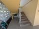 Stairwell with steps and metal railing at 2155 Wood St # B4, Sarasota, FL 34237
