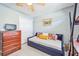 Bright bedroom featuring a daybed and built-in closet for storage at 13004 Waterbourne Dr, Gibsonton, FL 33534