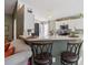 Kitchen bar with seating, perfect for casual dining and entertaining guests at 13004 Waterbourne Dr, Gibsonton, FL 33534