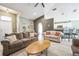 Bright living room features vaulted ceilings, ceiling fan, and an open layout into the kitchen at 13004 Waterbourne Dr, Gibsonton, FL 33534