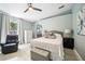 Inviting main bedroom with a calm color scheme and ample natural light at 13004 Waterbourne Dr, Gibsonton, FL 33534