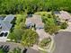 Expansive aerial view showcasing the home's pool, landscaping, and neighborhood at 13136 Peregrin Cir, Bradenton, FL 34212