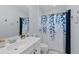 Functional bathroom with a single sink vanity, toilet and tub/shower combo at 13136 Peregrin Cir, Bradenton, FL 34212